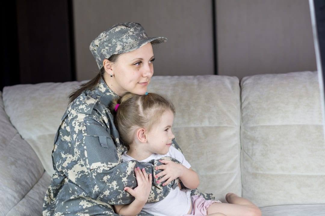 Emotional military homecoming with family — captured by The Montage Maven